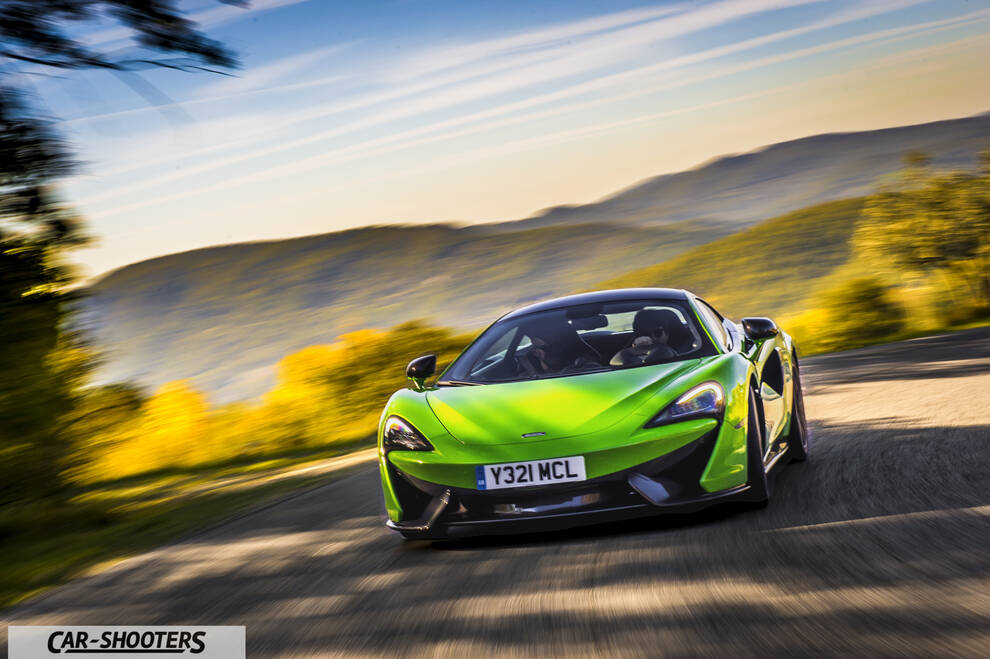 Mclaren 570S – front three-quarter, bright green on a country road