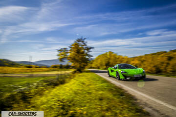 Mclaren 570S – front three-quarter, green on a country road