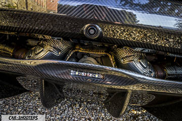 Mclaren 570S – detail, exposed carbon fiber exhaust detail
