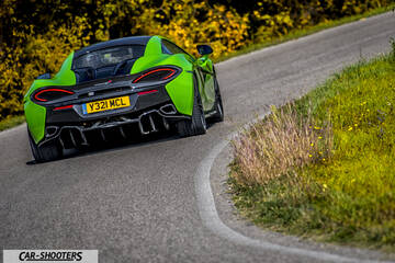 Mclaren 570S – rear three-quarter, green on a country road
