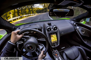 Mclaren 570S – interior, driving on a winding road