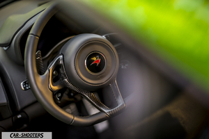 Mclaren 570S – dashboard, leather steering wheel close up