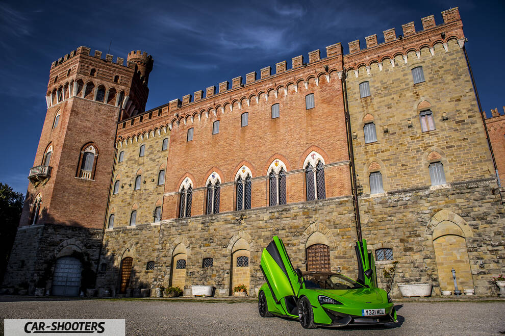 Mclaren 570S – front three-quarter, green against a castle backdrop