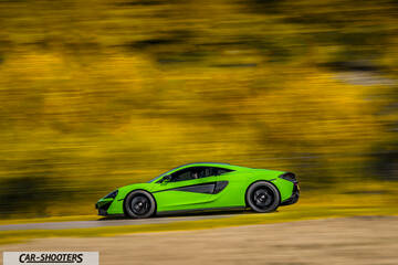 Mclaren 570S – side profile, green on a country road