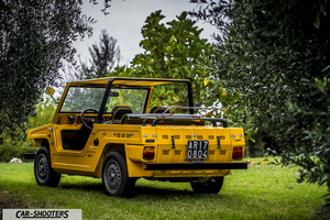 Fiat Jungla Savio – rear three-quarter, yellow parked on grass between trees