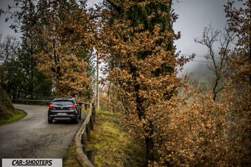 Mazda CX 3 – rear view, dark grey on a winding country road