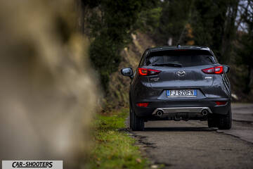Mazda CX 3 – rear view, grey metallic on a country road