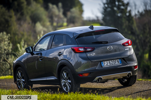 Mazda CX 3 – rear three-quarter, grey metallic on a country road