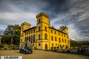 Mazda CX 3 – front three-quarter, dark grey in front of a castle