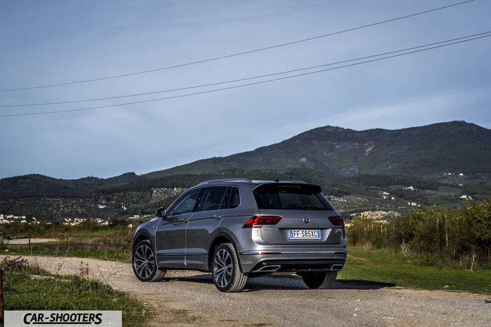 Volkswagen Tiguan – rear three-quarter, silver on a dirt road