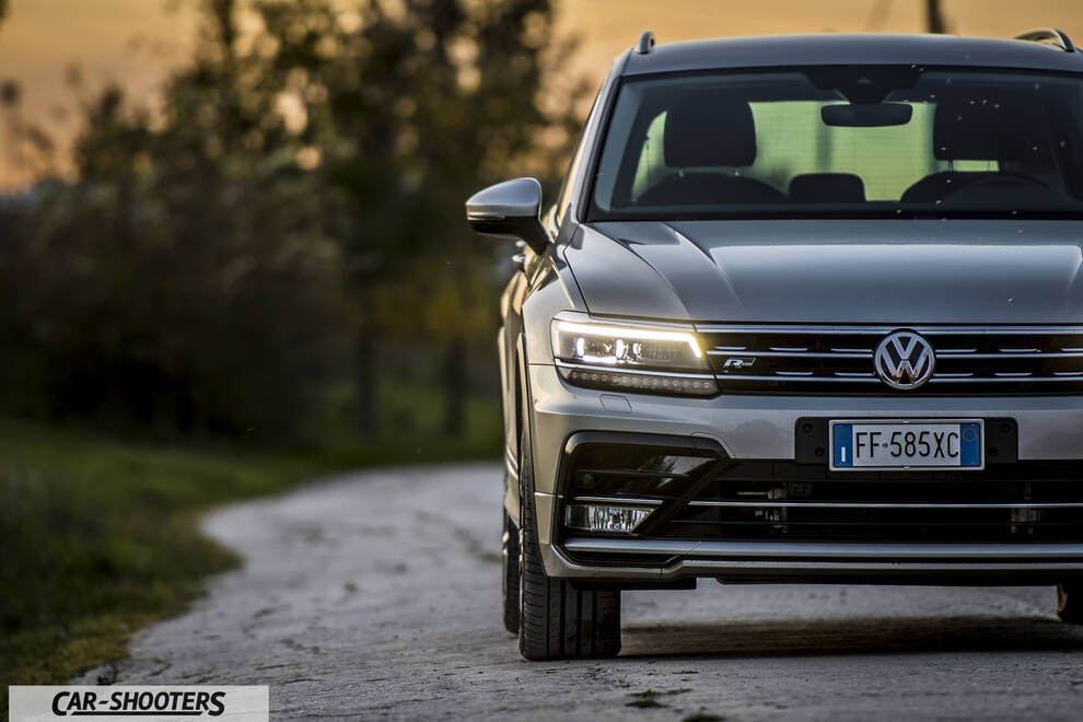 Volkswagen Tiguan – front three-quarter, silver on a country road
