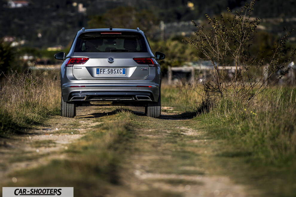 Volkswagen Tiguan – rear view, silver metallic on a country road