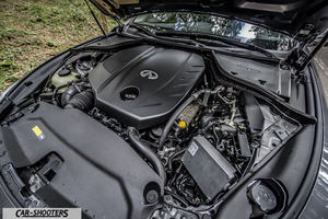 Infiniti Q50 – engine bay, clean engine compartment with plastic cover