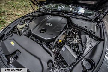 Infiniti Q50 – engine bay, clean engine compartment with plastic cover