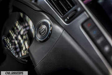 Infiniti Q50 – dashboard, engine start stop button close-up
