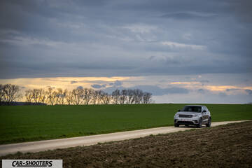 front three-quarter, silver on a country road