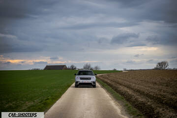 front three-quarter, silver on a country road