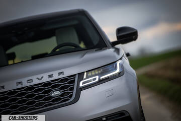 front three-quarter, silver on a country road