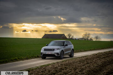 Rover – front three-quarter, silver metallic on a country road