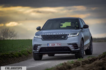 front three-quarter, silver on a country road