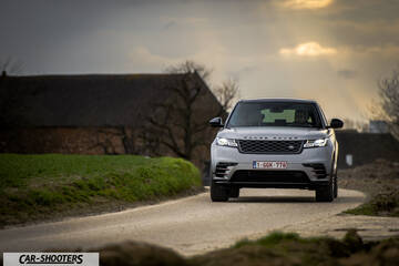 front three-quarter, silver on a country road