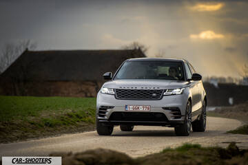 front three-quarter, silver on a country road