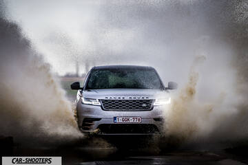 front three-quarter, silver splashing through water
