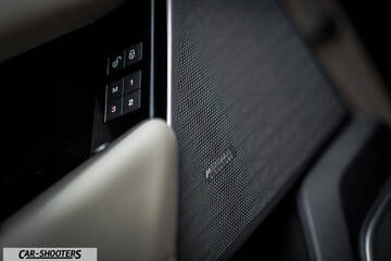 detail, speaker grille and seat controls
