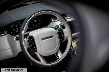 dashboard, leather steering wheel close-up