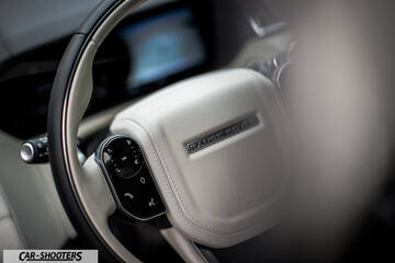 dashboard, leather steering wheel close-up