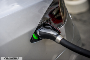 Tesla Model S – detail, charging port plug-in close-up