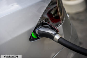 Tesla Model S – detail, charging port plug-in close-up