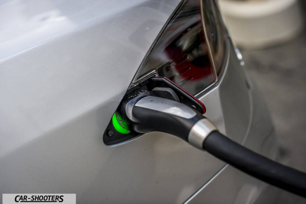 Tesla Model S – detail, charging port plug-in close-up