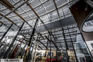 Tesla Model S – detail, inside a glass showroom