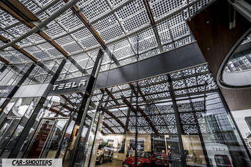 Tesla Model S – detail, inside a glass showroom