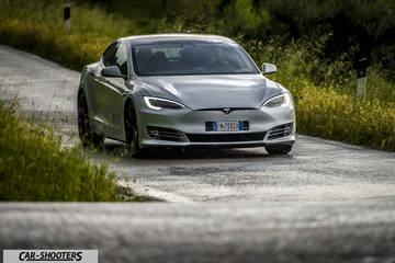 Tesla Model S – front three-quarter, silver on a country road