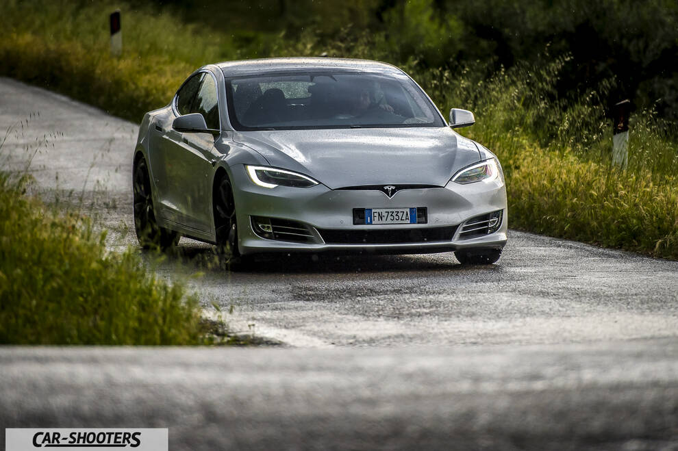 Tesla Model S – front three-quarter, silver on a country road