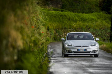 Tesla Model S – front three-quarter, silver on a country road