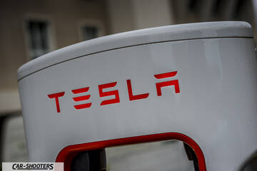 Tesla Model S – detail, tesla supercharger logo close-up