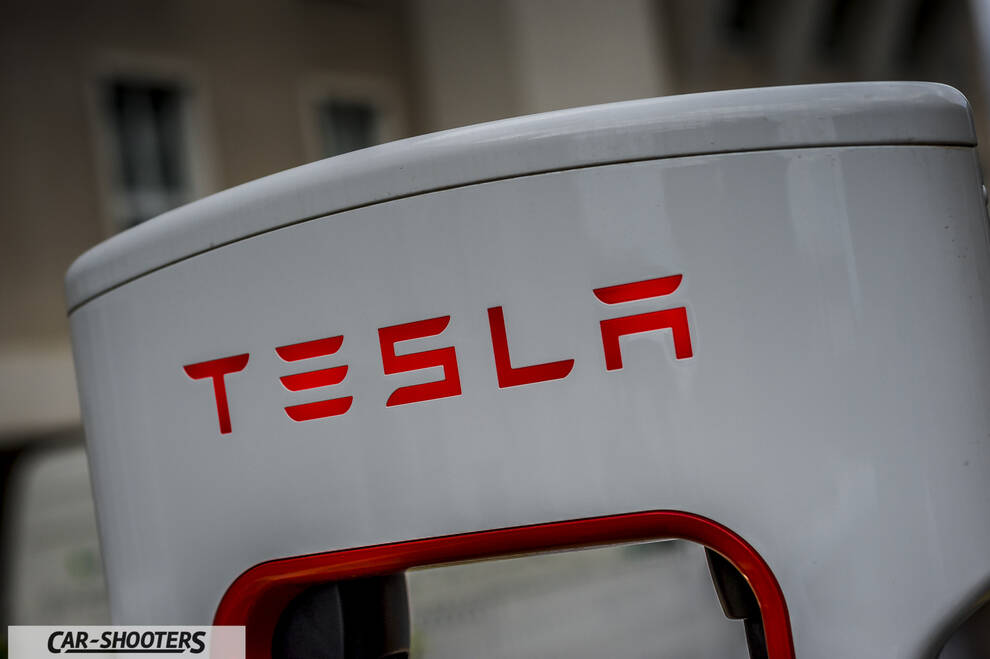 Tesla Model S – detail, tesla supercharger logo close-up