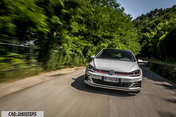 Volkswagen Golf GTI – front three-quarter, silver on a country road