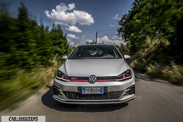 Volkswagen Golf GTI – front three-quarter, silver metallic on a country road