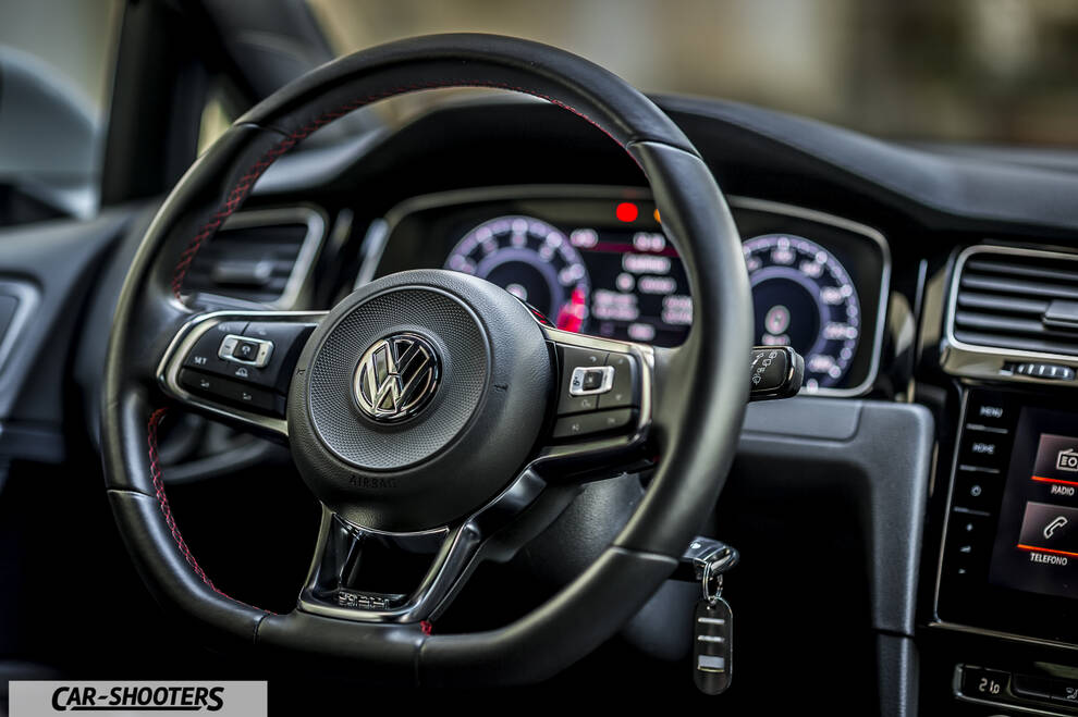 Volkswagen Golf GTI – dashboard, leather steering wheel close-up