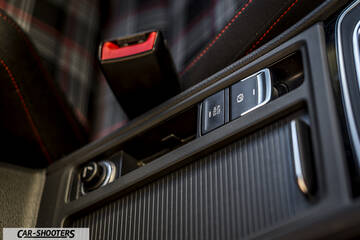 Volkswagen Golf GTI – interior, center console and seatbelt buckle