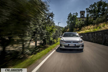 Volkswagen Golf GTI – front three-quarter, silver on a country road
