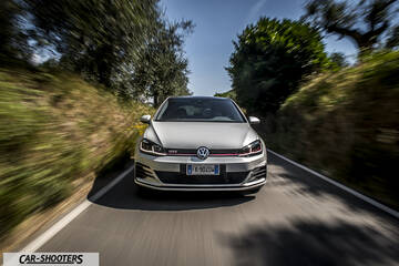 Volkswagen Golf GTI – front three-quarter, silver on a country road