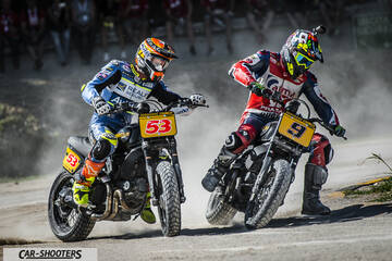 front three-quarter, black racing on a dirt track
