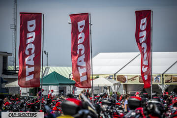 detail, red flags with ducati branding