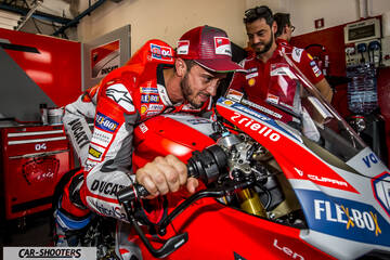 detail, motorcycle rider in garage