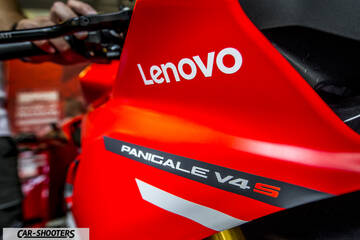 detail, close-up of red fairing with lenovo and panigale branding